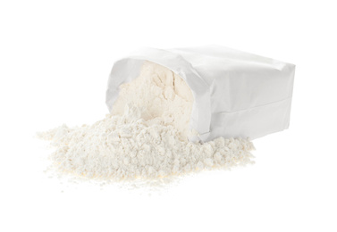 Photo of Overturned paper bag with flour isolated on white