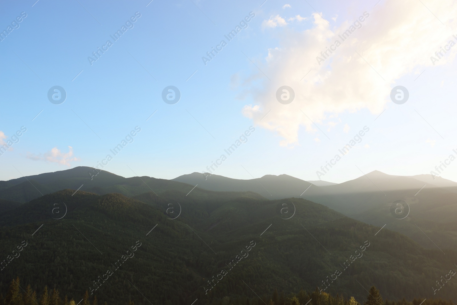 Photo of Beautiful view of blue sky over mountains on sunny day