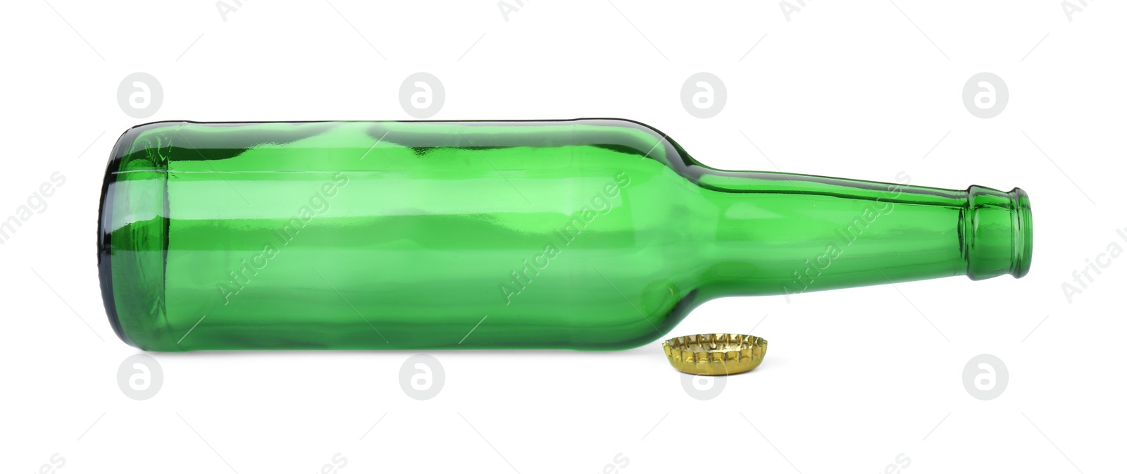 Photo of One empty green beer bottle and cap isolated on white