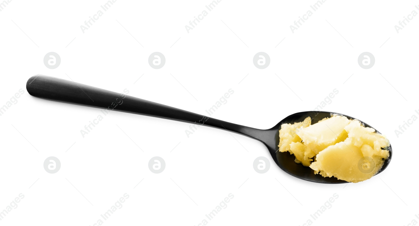 Photo of Spoon of Ghee butter isolated on white, top view