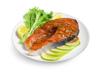 Photo of Tasty salmon steak with sauce, citrus slices and lettuce on white background