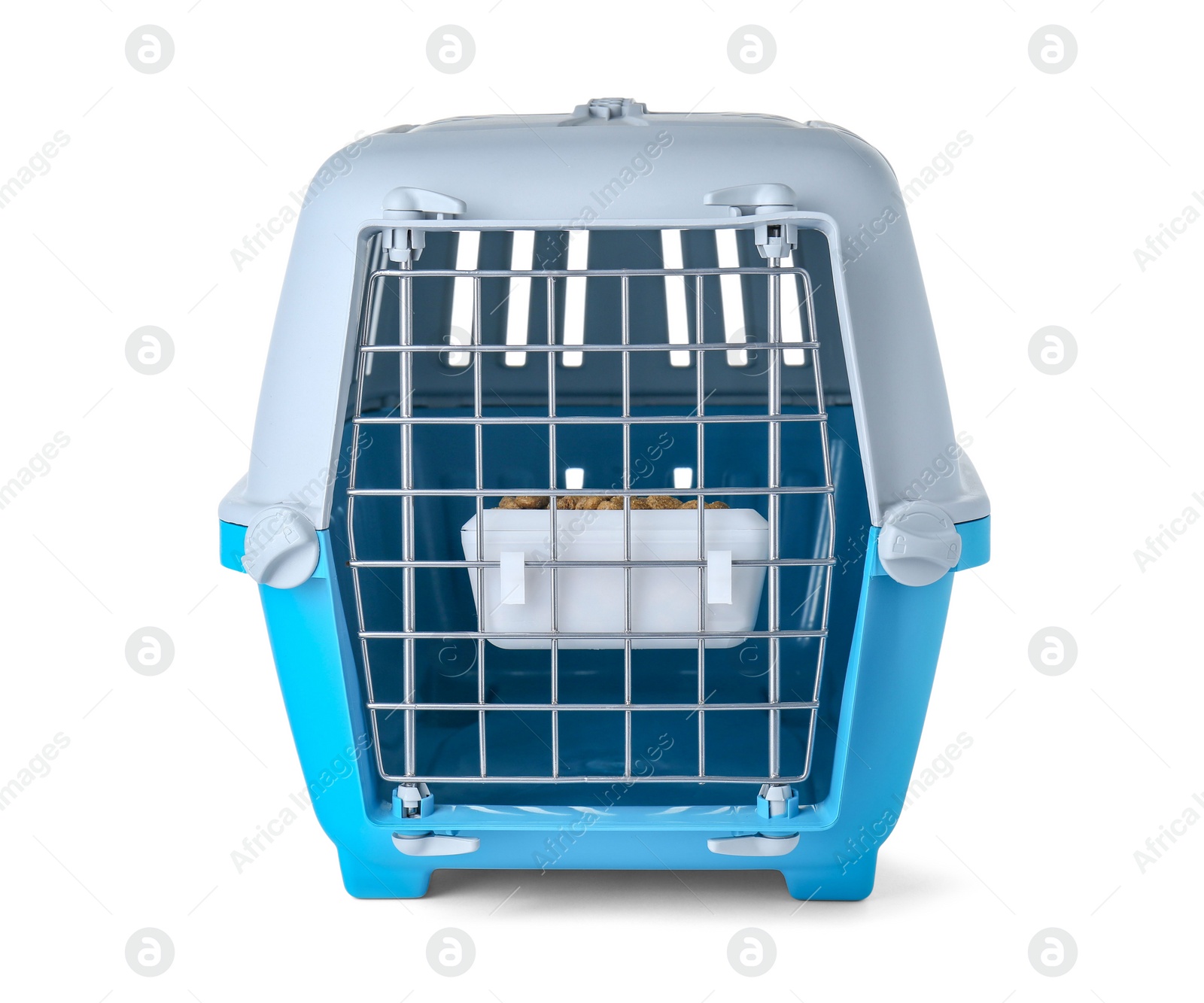 Photo of Light blue pet carrier with bowl of dry food isolated on white