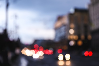 Blurred view of modern city at evening. Bokeh effect