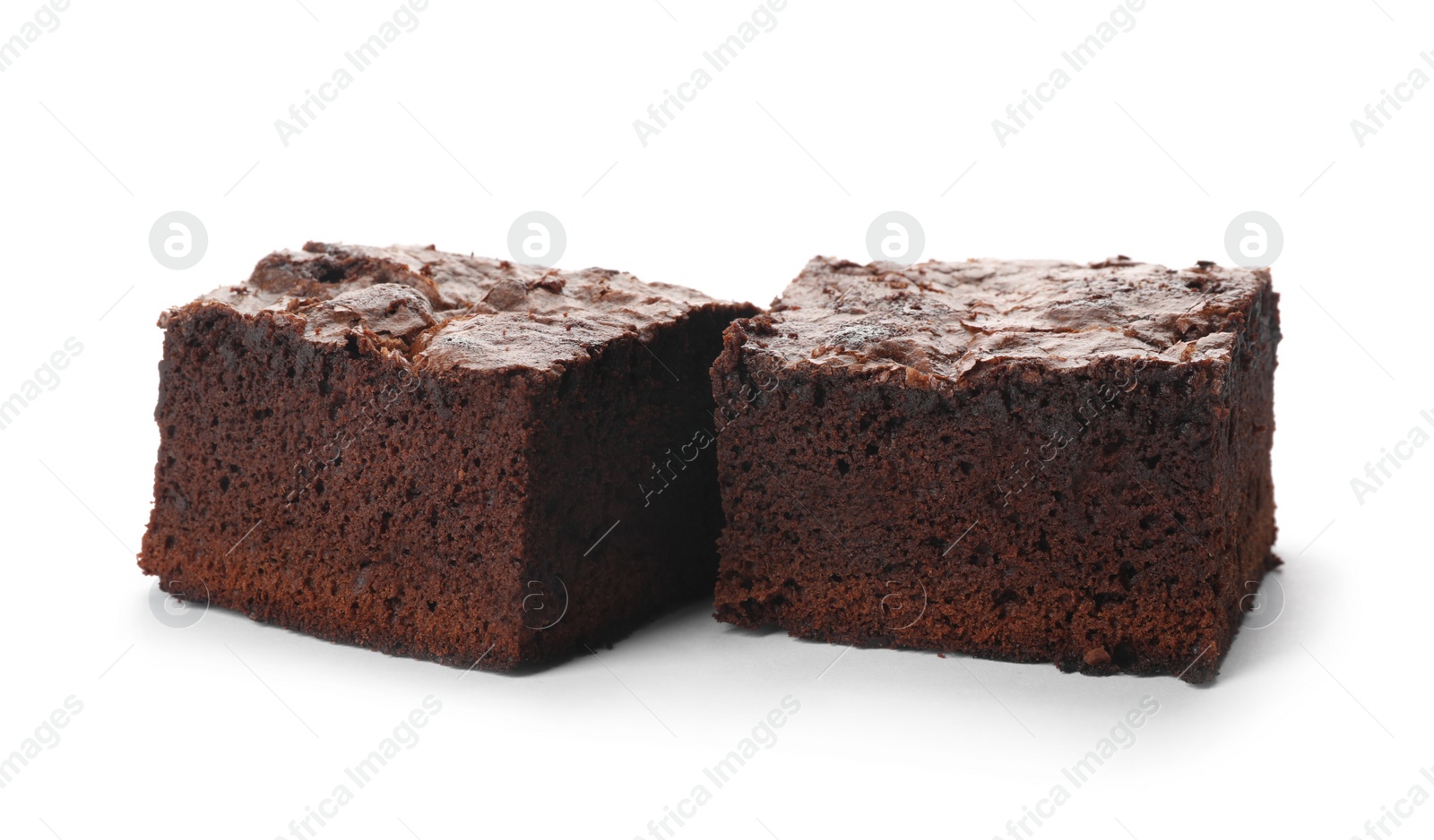 Photo of Pieces of fresh brownie on white background. Delicious chocolate pie