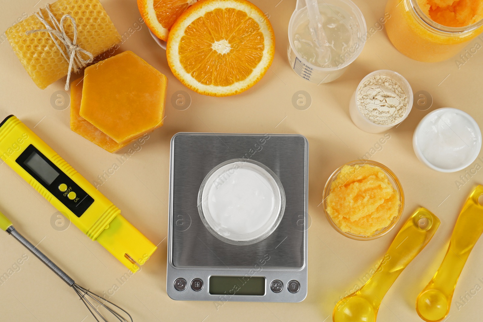 Photo of Flat lay composition with homemade cosmetic products and fresh ingredients on beige background