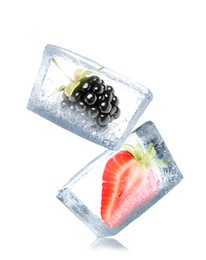 Image of Strawberry and blackberry frozen in ice cubes on white background