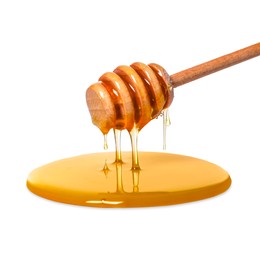 Natural honey dripping from dipper on white background