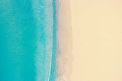 Image of Beautiful sandy beach and sea, top view