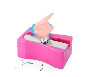 Pink sharpener with pencil shavings on white background