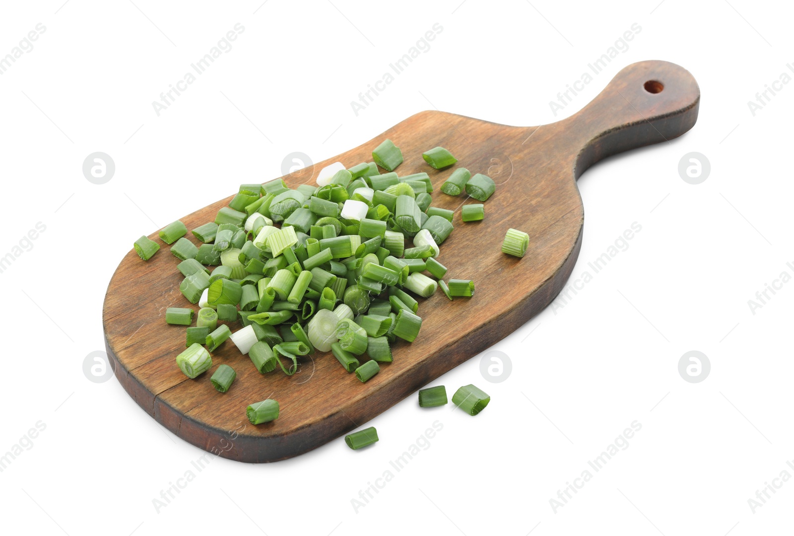 Photo of Wooden board with chopped green onion isolated on white