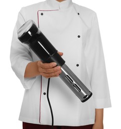 Photo of Chef holding sous vide cooker on white background, closeup