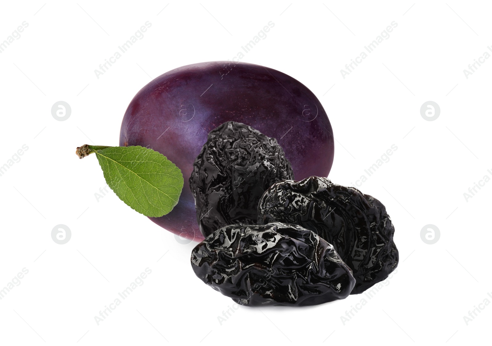 Image of Delicious fresh ripe plum and sweet dried prunes on white background 