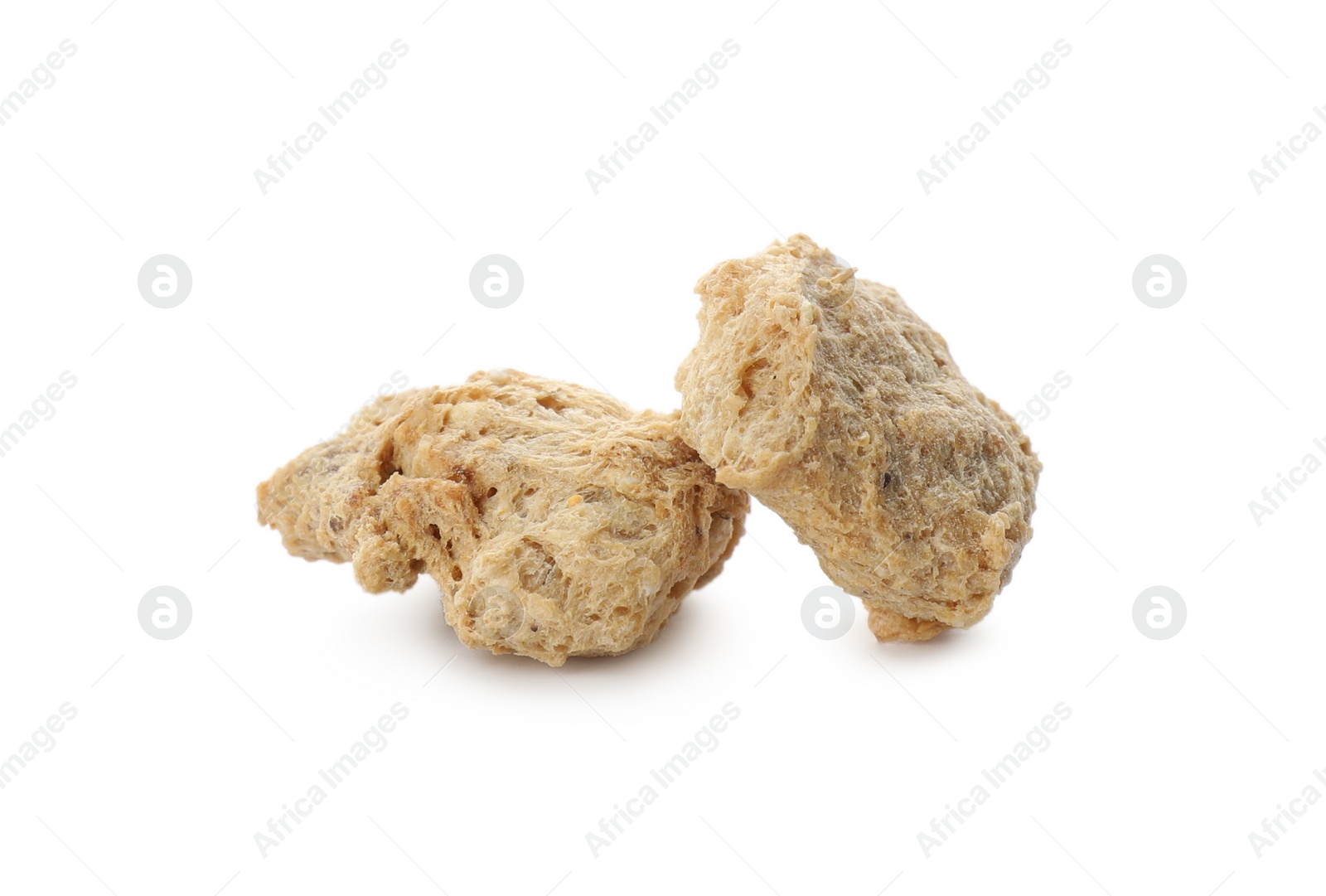 Photo of Dehydrated soy meat chunks on white background