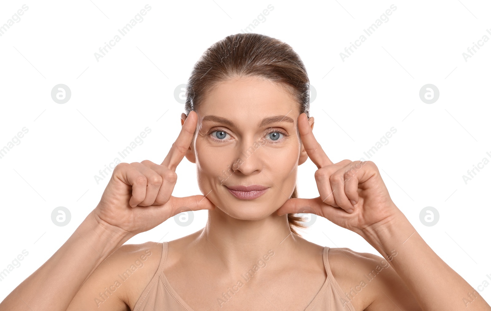 Photo of Woman massaging her face on white background