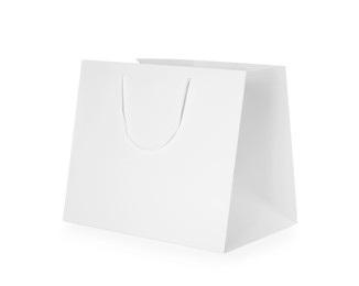 Photo of One paper shopping bag isolated on white