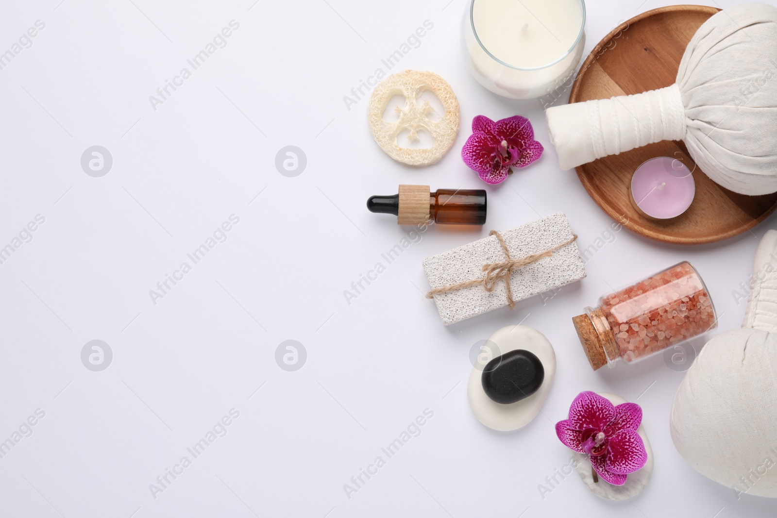 Photo of Flat lay composition with different spa products on white background, space for text