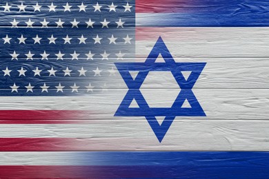 Image of International relations. National flags of Israel and USA painted on wooden surface