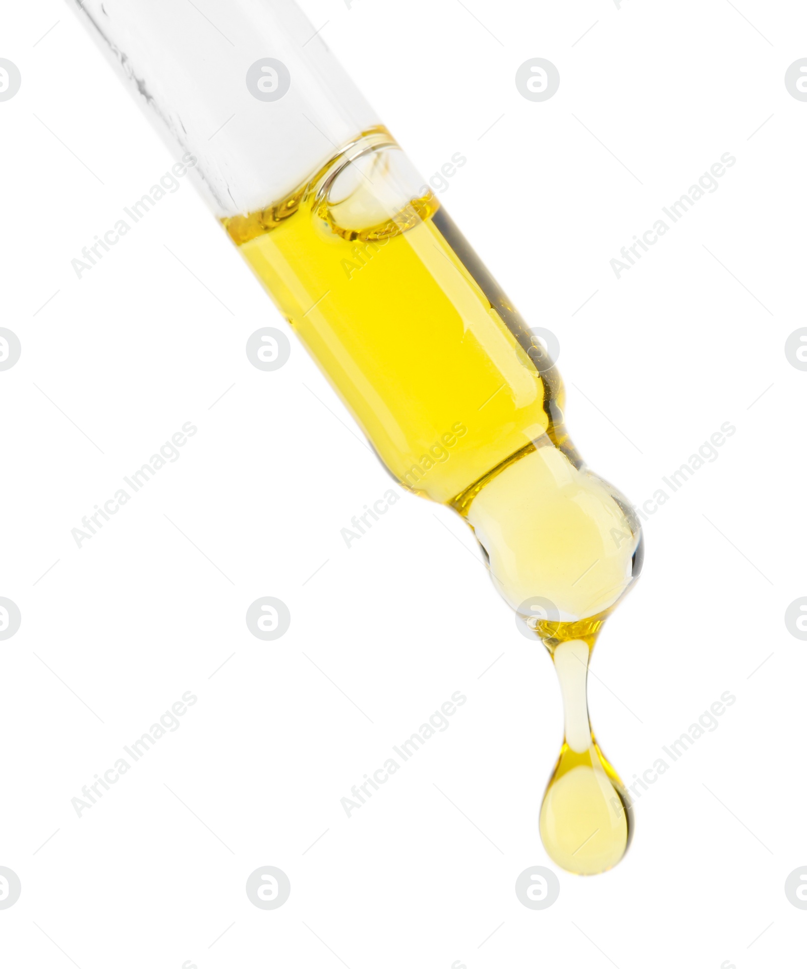 Photo of Dripping tincture from pipette isolated on white