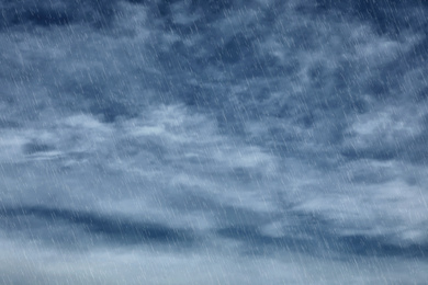 Image of Heavy rain and sky covered with clouds. Stormy weather