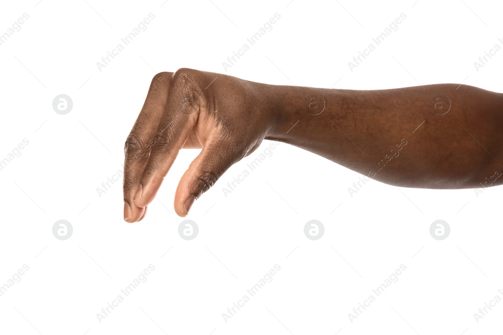 Photo of African-American man holding something in hand on white background, closeup