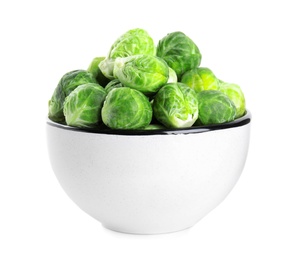 Photo of Fresh Brussels sprouts in bowl isolated on white