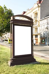 Photo of Blank citylight poster on street in city. Space for design