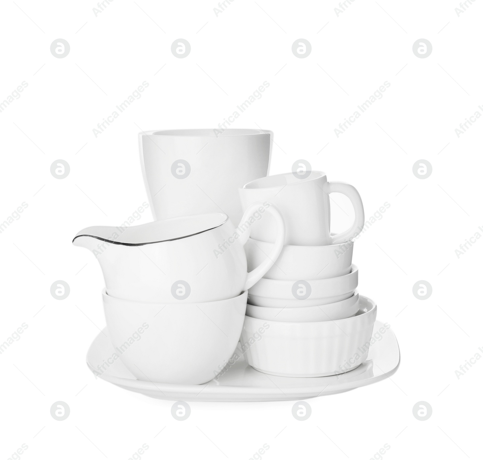 Photo of Set of clean dishes on white background