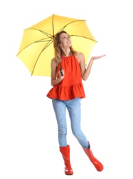 Photo of Woman with yellow umbrella on white background