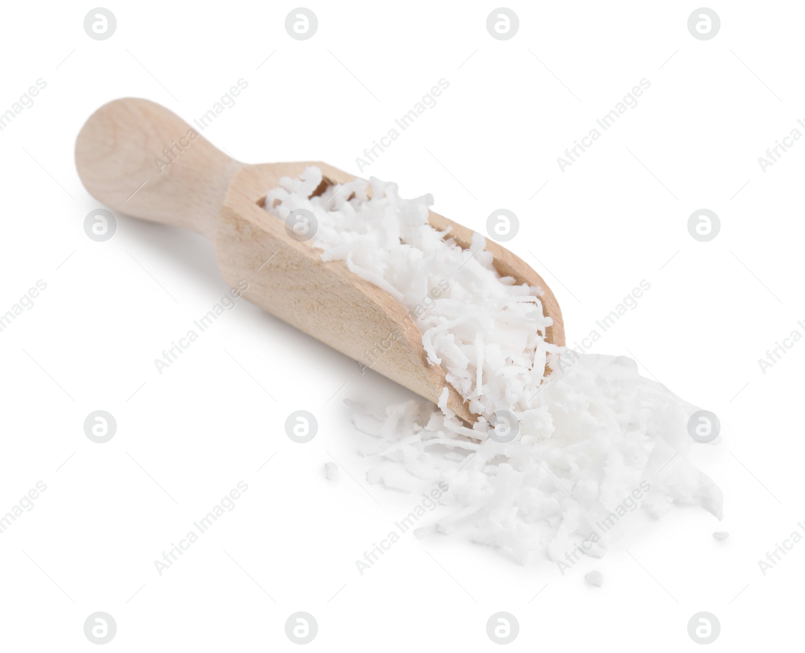 Photo of Coconut flakes in wooden scoop isolated on white