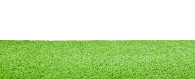 Photo of Green artificial grass surface isolated on white