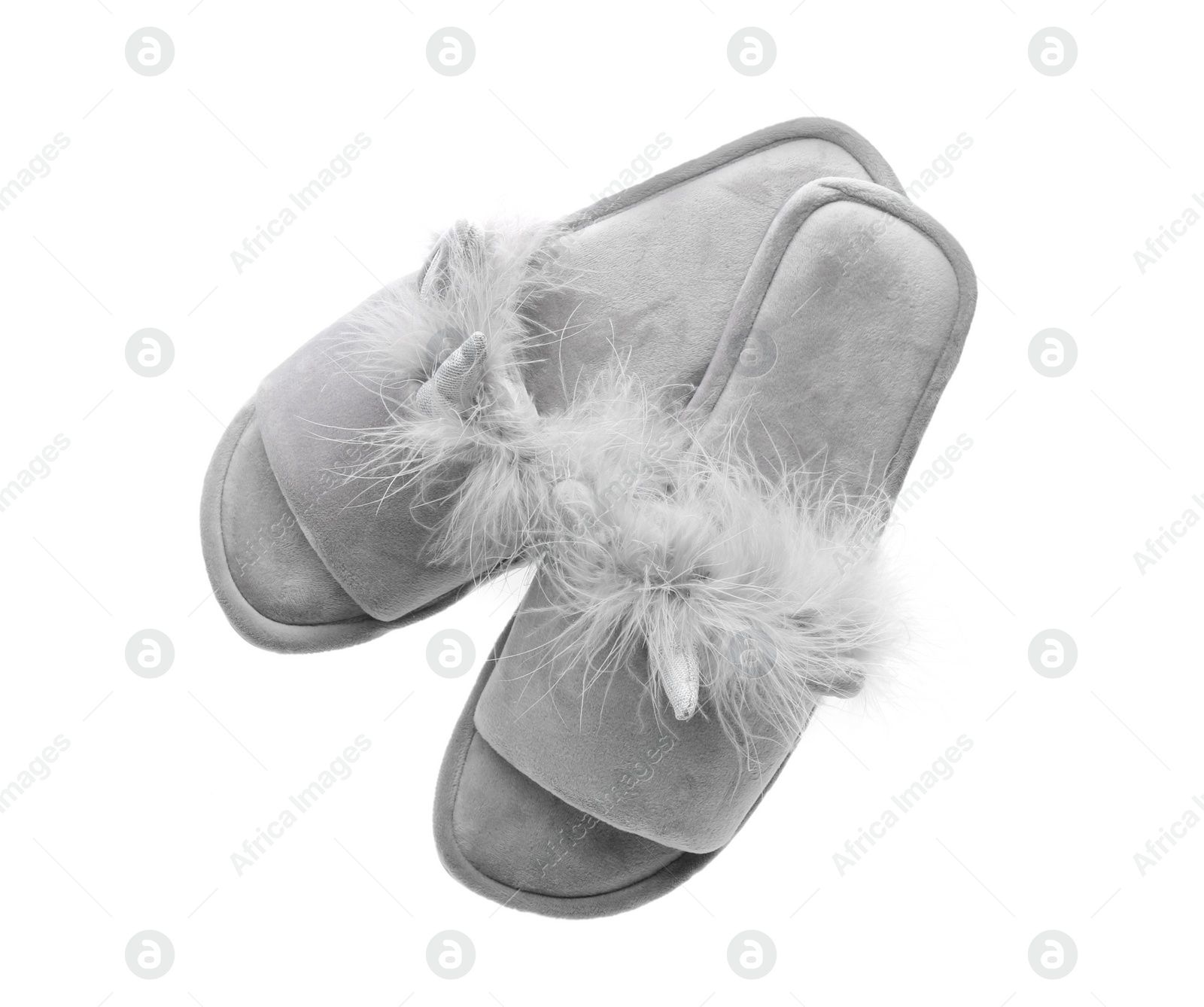 Photo of Stylish soft slippers on white background, top view