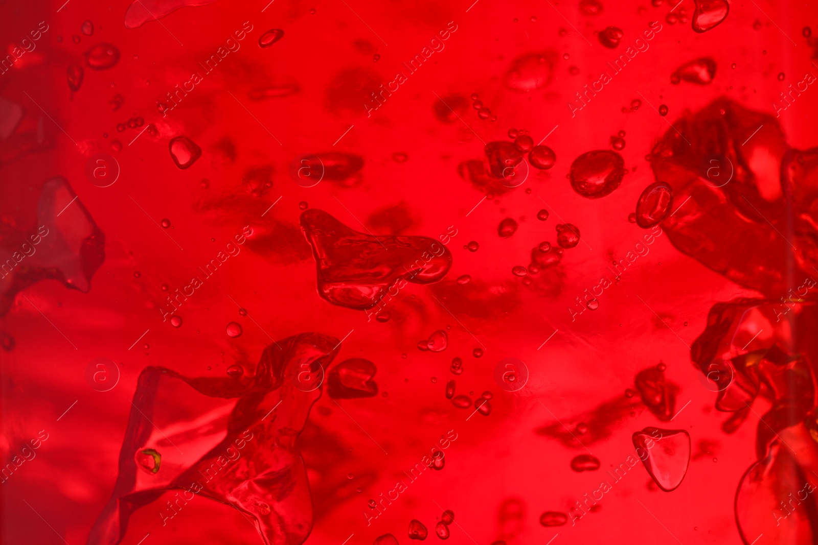 Photo of Delicious red fruit jelly as background, closeup
