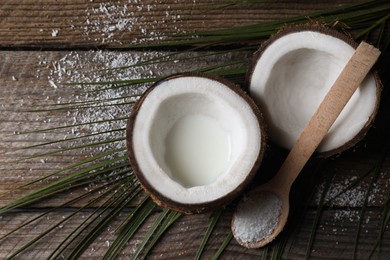 Photo of Flat lay composition with coconut milk on wooden table, space for text