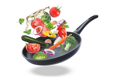 Tasty fresh ingredients and frying pan on white background