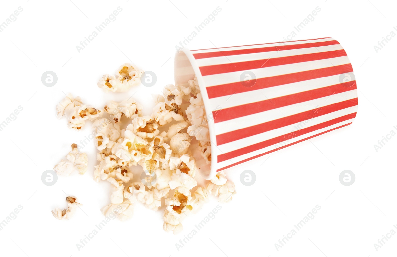 Photo of Bucket of tasty pop corn isolated on white, top view