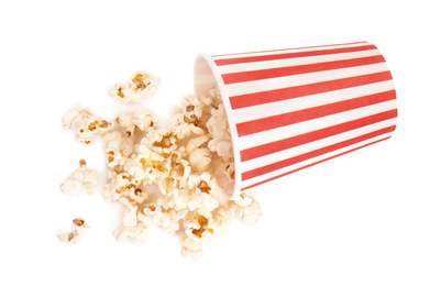 Bucket of tasty pop corn isolated on white, top view