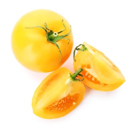 Photo of Cut ripe yellow tomatoes isolated on white, top view