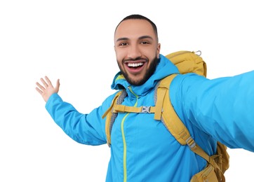 Smiling young man taking selfie on white background