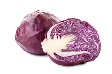 Whole and sliced red cabbage on white background