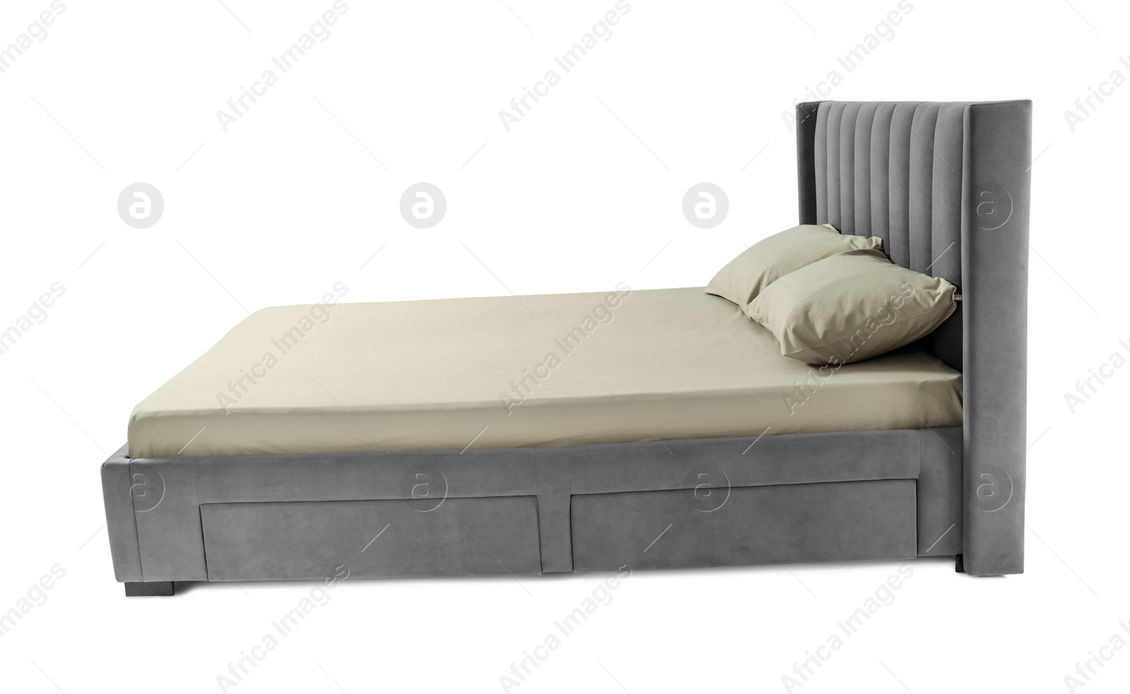 Photo of Comfortable gray bed with linens on white background