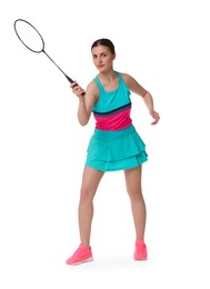 Young woman playing badminton with racket on white background