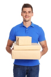 Happy young courier with parcels on white background