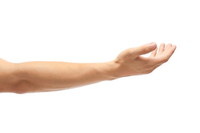 Photo of Young man held out hand on white background, closeup