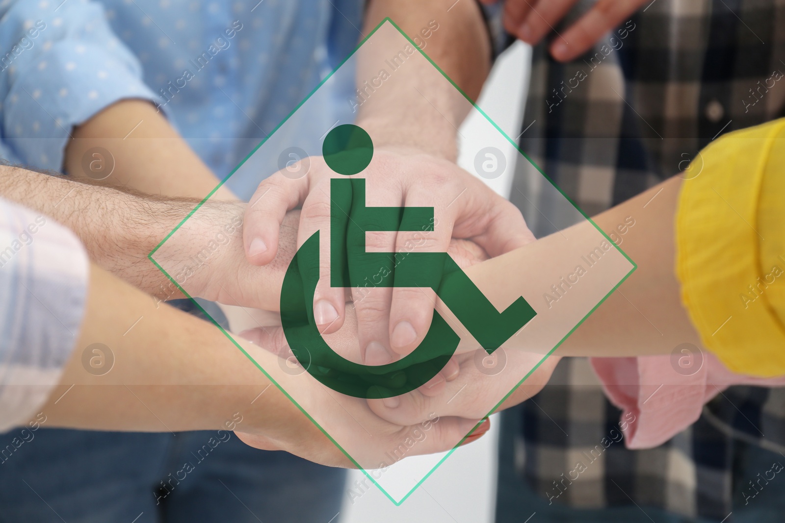 Image of Inclusion concept. International symbol of access. People holding hands together, closeup