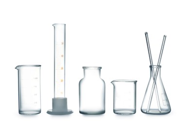 Photo of Empty clean laboratory glassware on white background