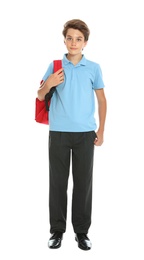 Happy boy in school uniform on white background