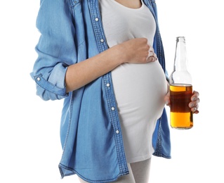 Photo of Future mother with bottle of alcohol drink on white background, closeup. Bad habits during pregnancy