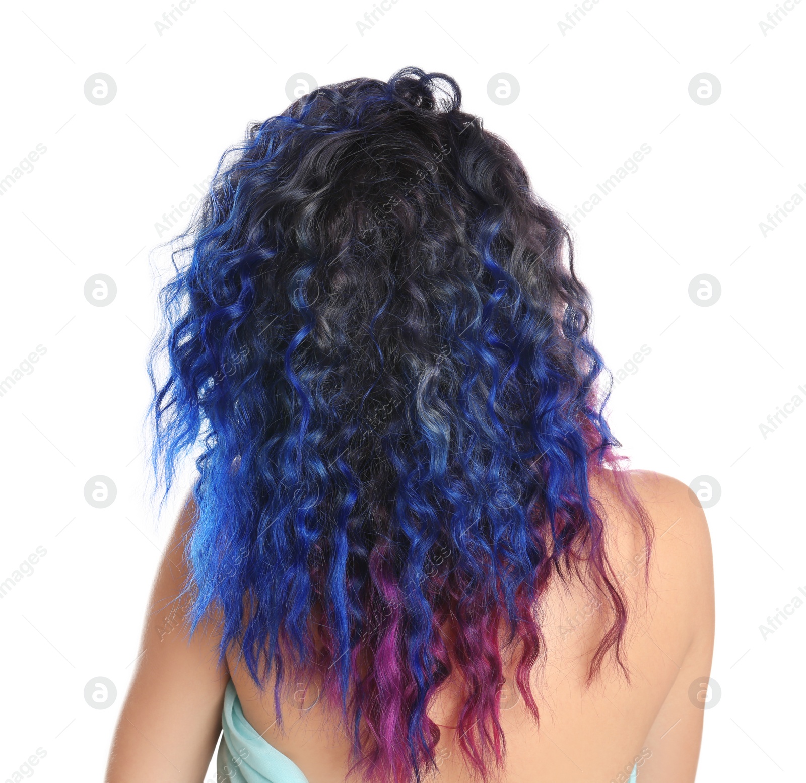 Photo of Young woman with bright dyed hair on white background, back view