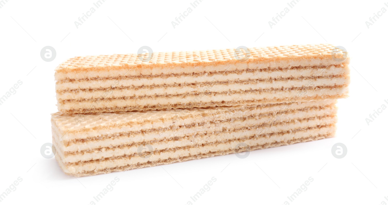 Photo of Delicious cream wafer sticks isolated on white