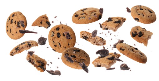 Image of Delicious chocolate chip cookies and pieces of chocolate falling on white background